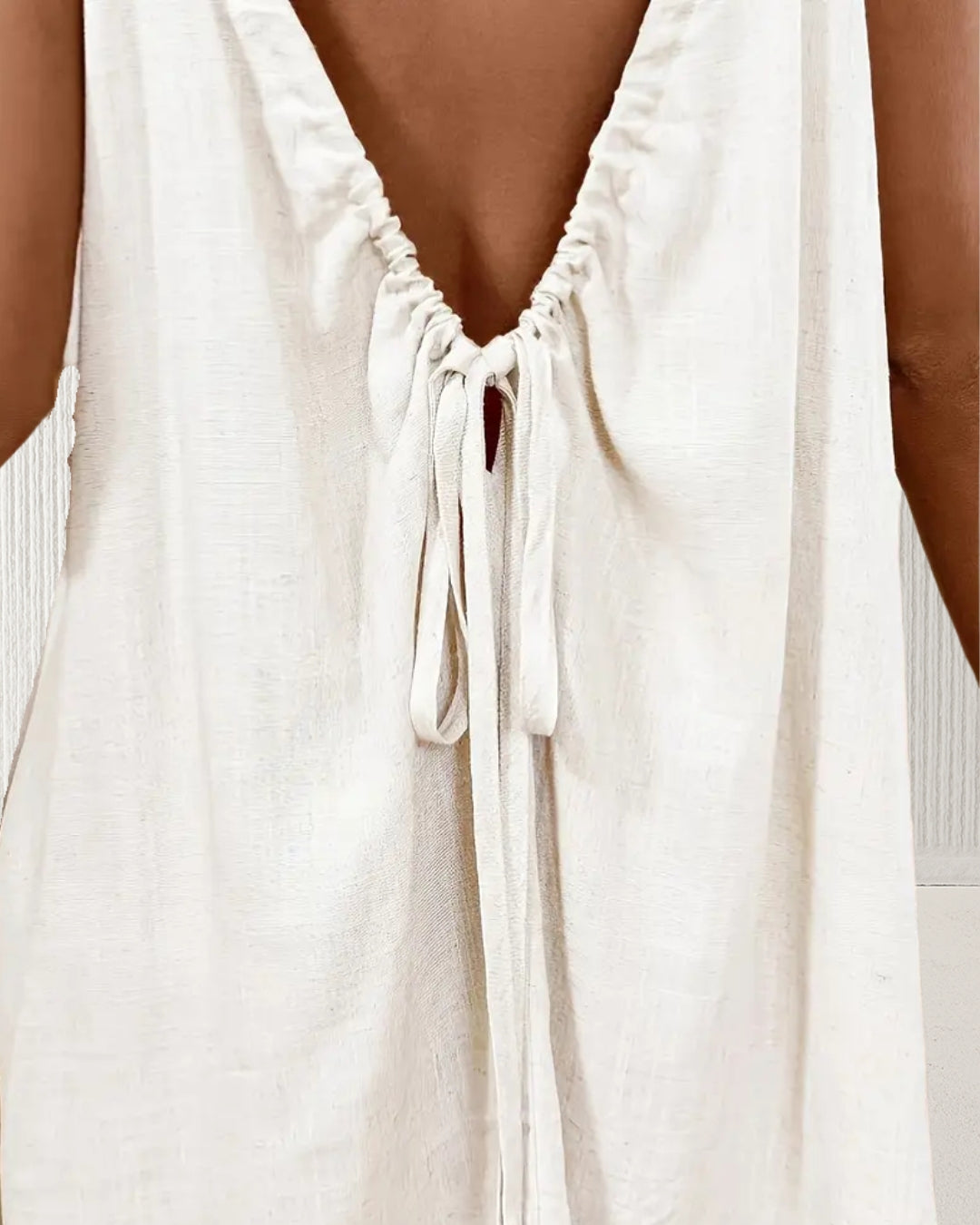 Aurora Backless Short Dress – Off-White; close-up of drawstring tie-back and linen-look texture.