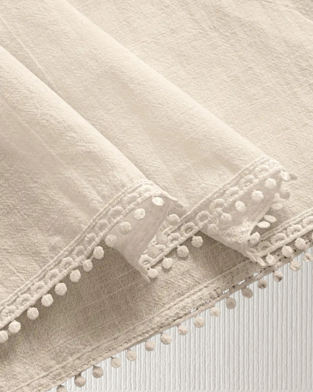 Aurora Camisole Top – Beige, hem trim close-up; lightweight cotton, airy drape.