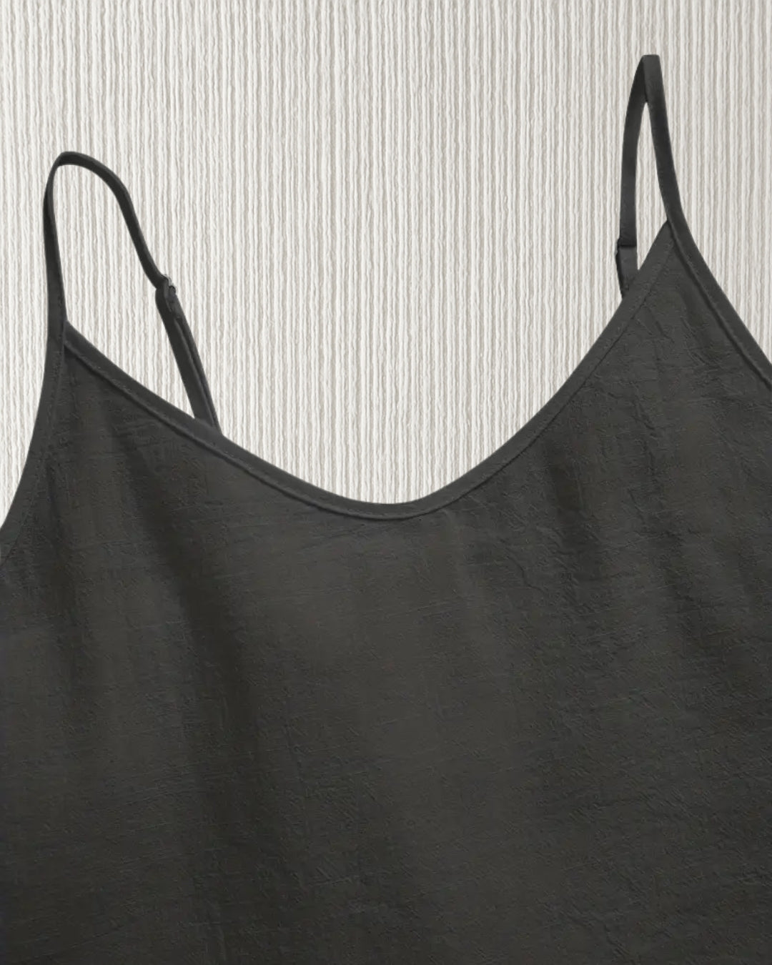 Aurora Camisole Top – Black, adjustable spaghetti strap close-up; cotton cami, custom fit.