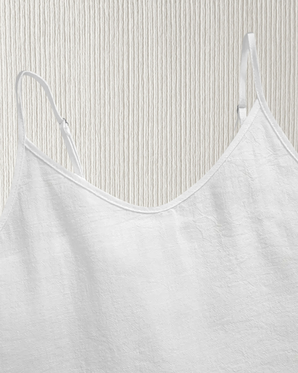 Aurora Camisole Top – White, adjustable spaghetti strap detail; cotton cami with V-neck for customisable fit.