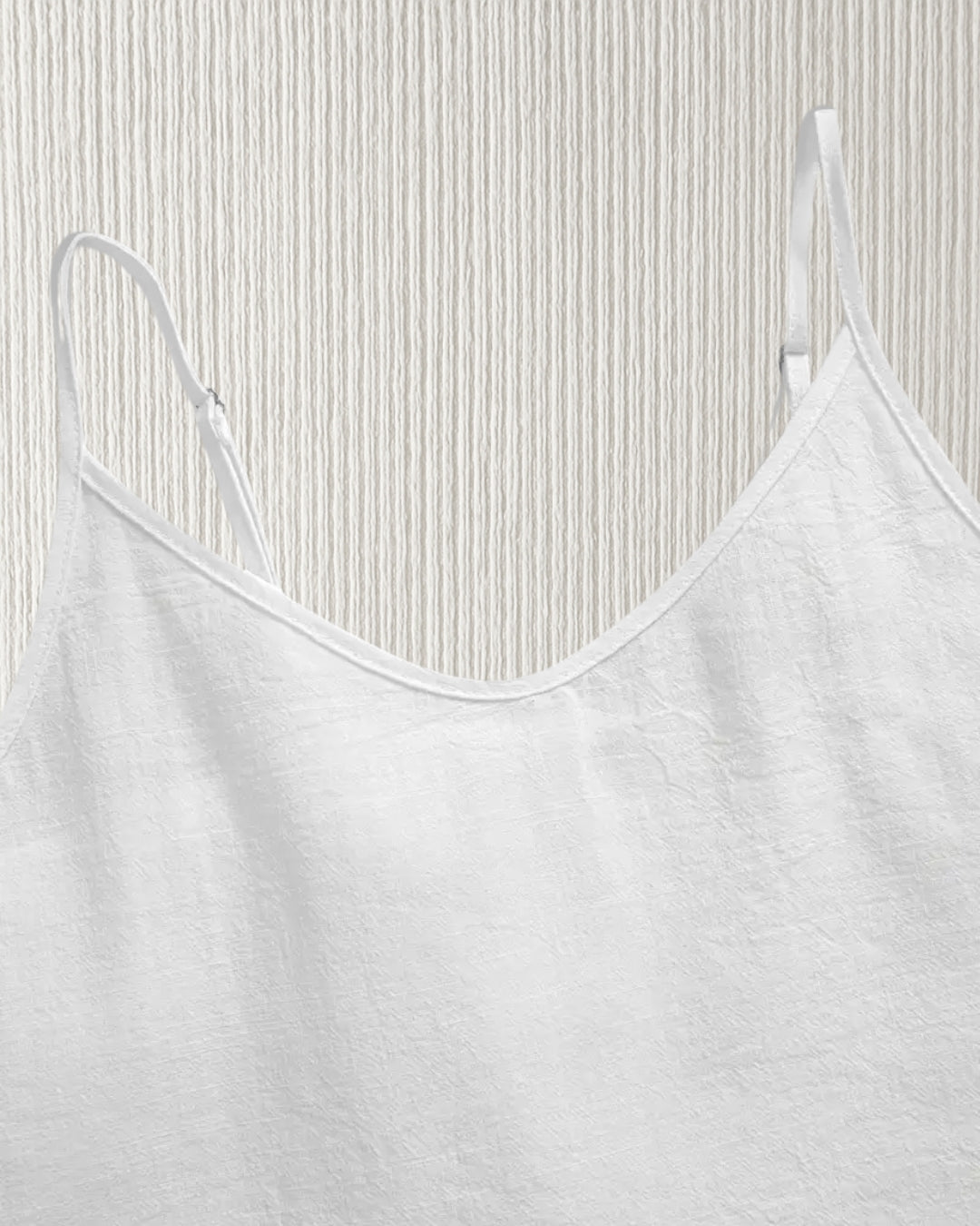 Aurora Camisole Top – White, adjustable spaghetti strap detail; cotton cami with V-neck for customisable fit.