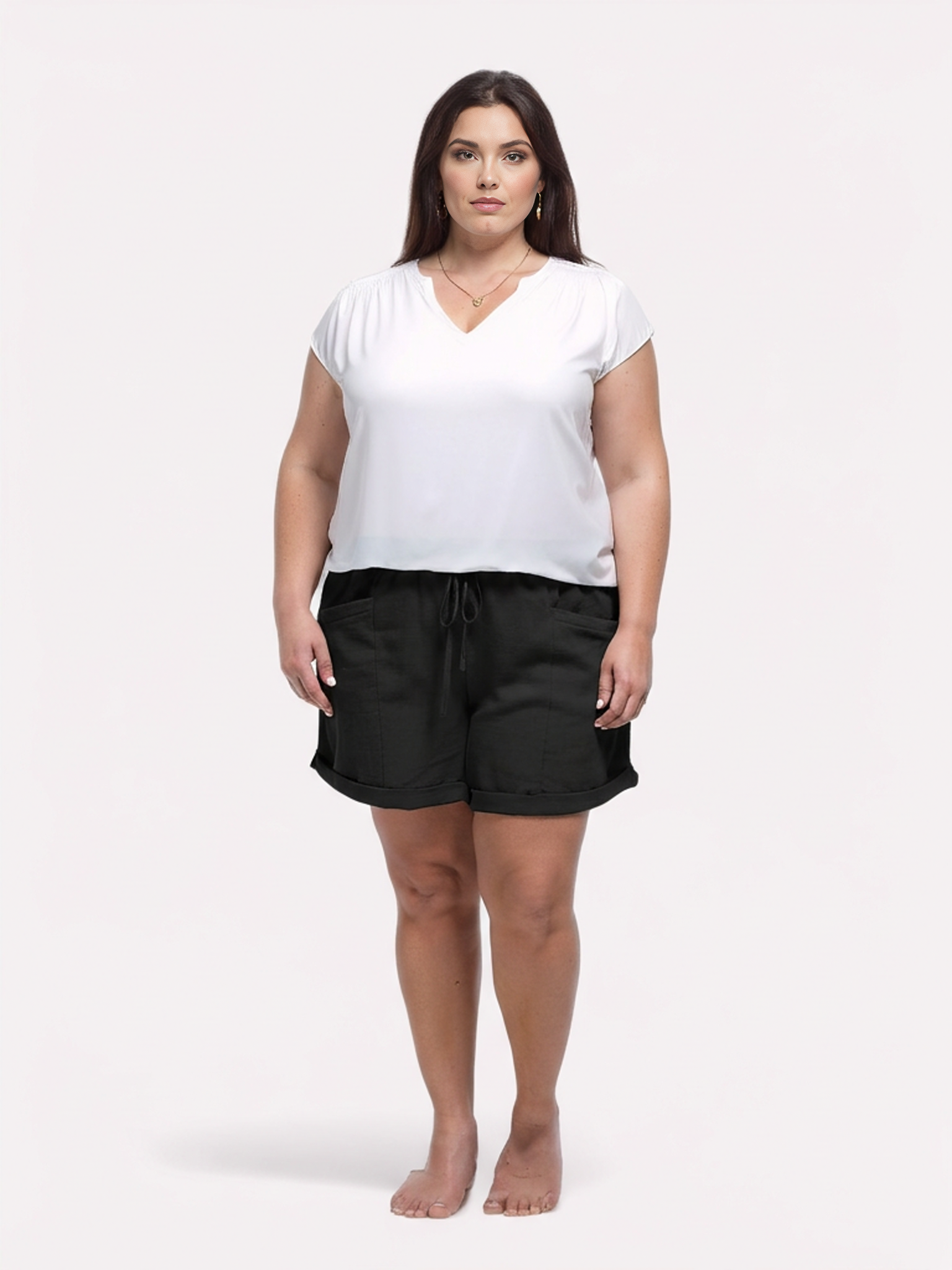 Aurora Plus Size Cotton Shorts – Black; breathable 100% cotton, elasticised waist, front pockets, relaxed leg; AU sizes 16–24 – front view of curvy model