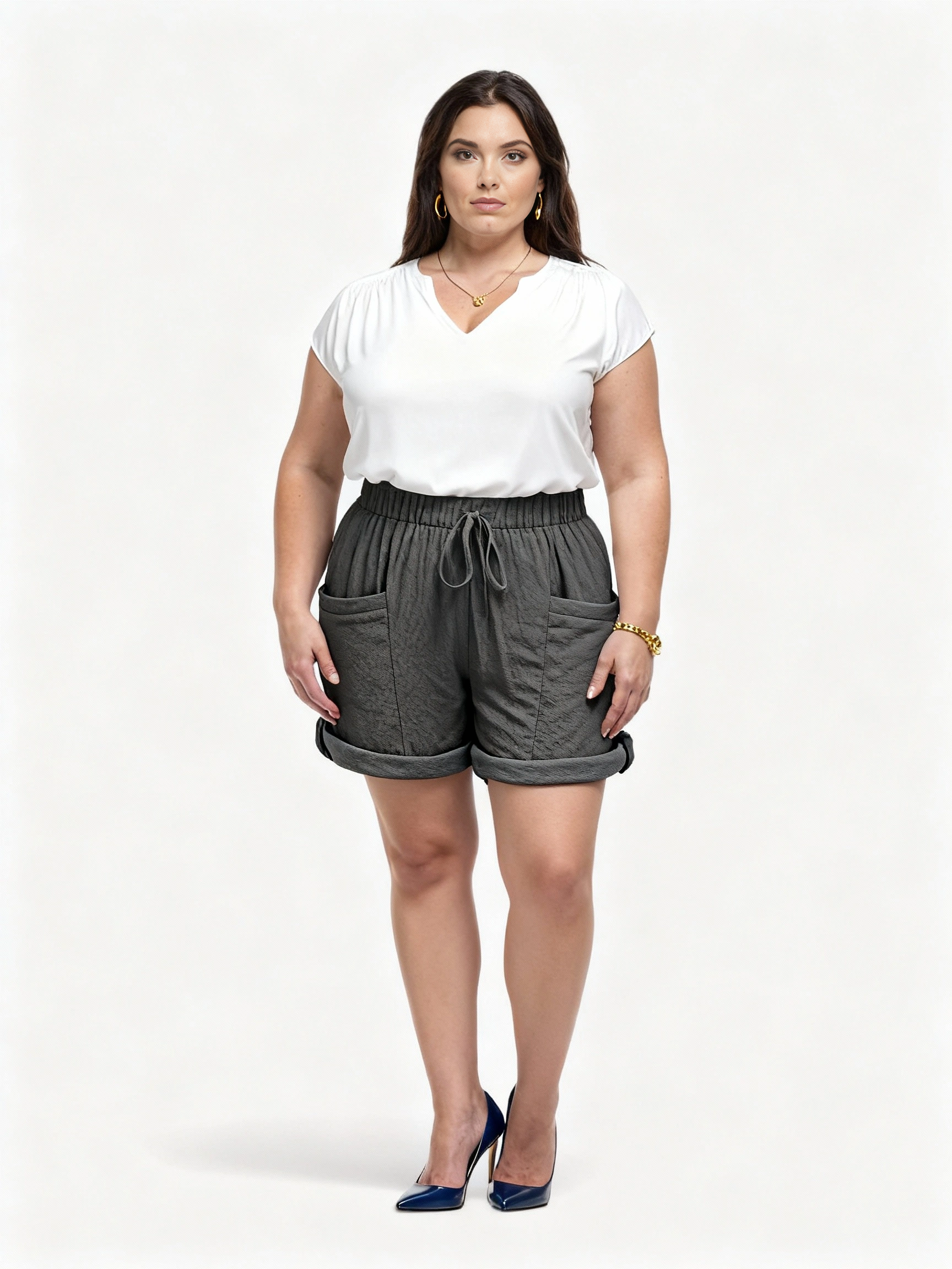 Aurora Plus Size Cotton Shorts – Olive; 100% cotton pull-on shorts with elasticised waist, large pockets, relaxed leg; AU sizes 16–24 – curvy lifestyle model view.