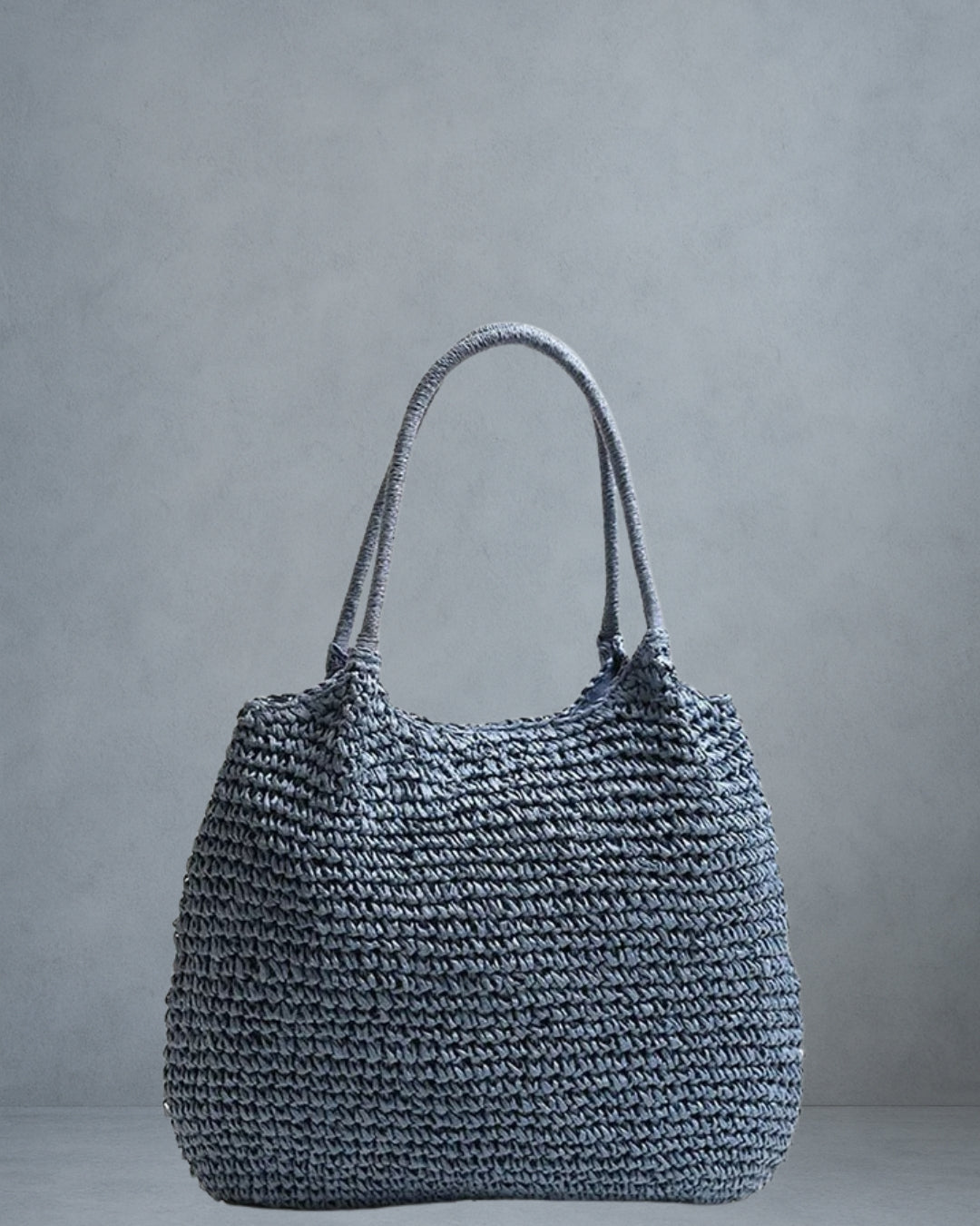 Coastal Raffia Tote Bag – Blue; raffia-style straw tote bag with inner lining and magnetic clasp; lightweight beach-to-market carry.