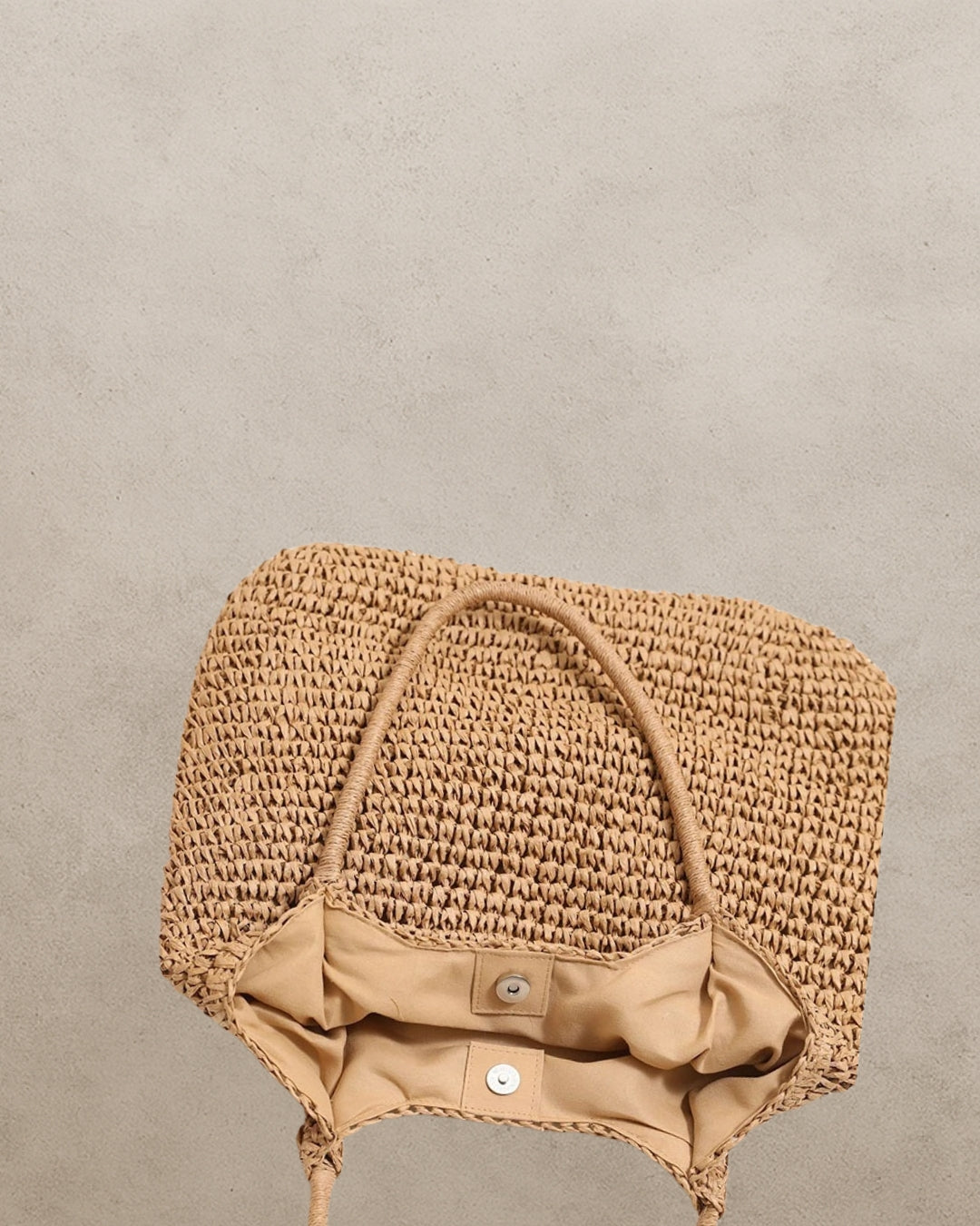Interior detail – Tan colourway of Coastal Raffia Tote Bag; lined straw tote with magnetic clasp and roomy compartment; construction identical to Blue.