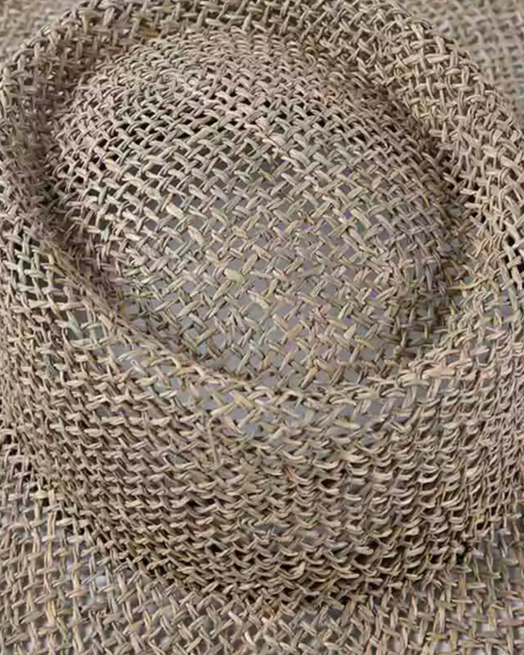 Coastal Rattan Wide Brim Straw Hat top view; circular crown and wide brim in natural rattan, lightweight summer hat.